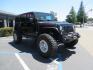 2017 BLACK /BLACK Jeep Wrangler Unlimited Rubicon 4WD (1C4BJWFG5HL) with an 392 Hemi Swapped engine, located at 2630 Grass Valley Highway, Auburn, CA, 95603, (530) 508-5100, 38.937893, -121.095482 - !!!!!!!!!!! NOT FOR SALE IN CA !!!!!!!!!!!!!! 392 Hemi swapped JK with a ton of extras...... Teraflex Long arm suspension system, Fox 2.0 remote reservoir shocks, Fox ATS steering stabilizer, Teraflex bump stops, Limit straps, Adams front and rear drivelines, Teraflex exhuast spacer, Dakota Custo - Photo#2